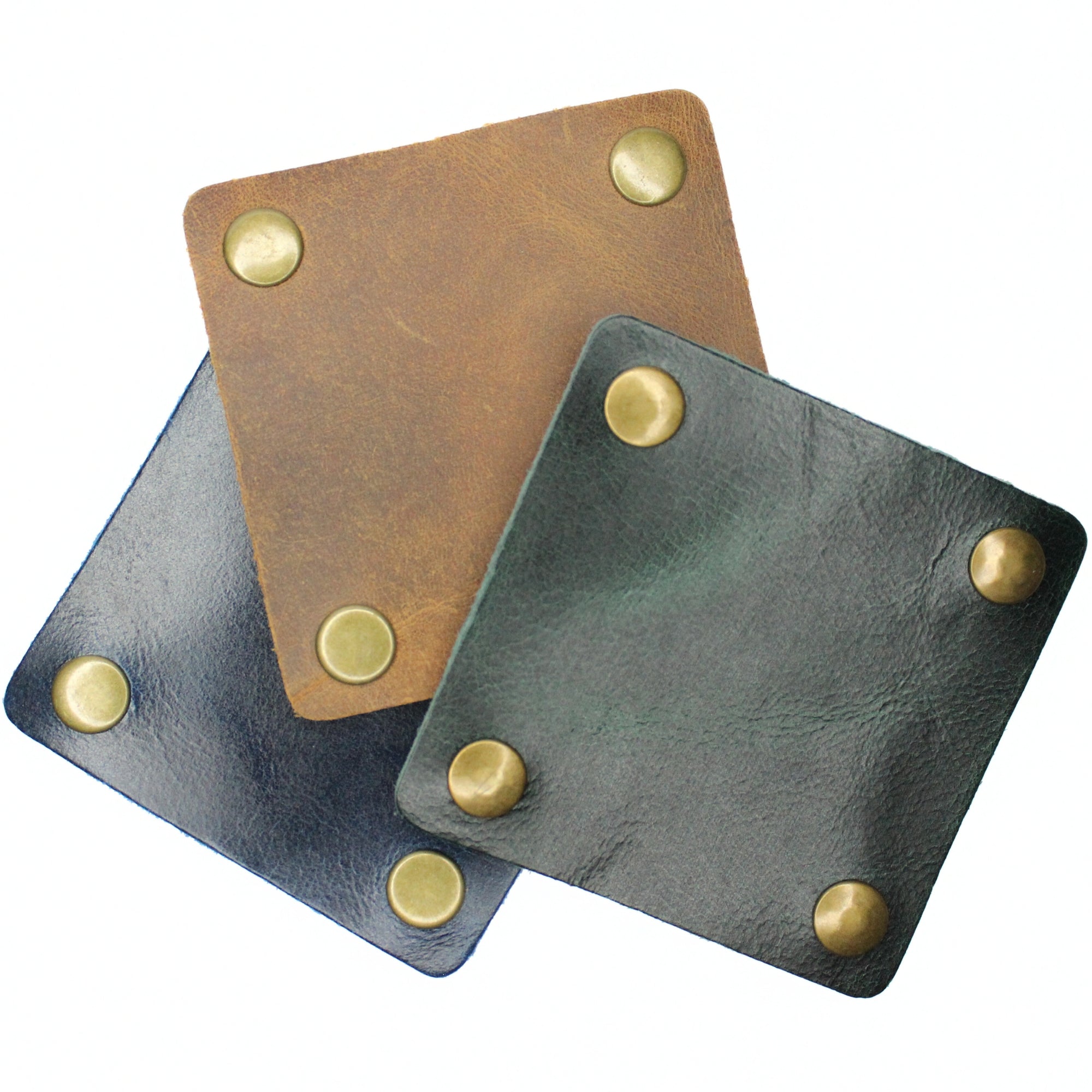 Three stacked leather coasters 