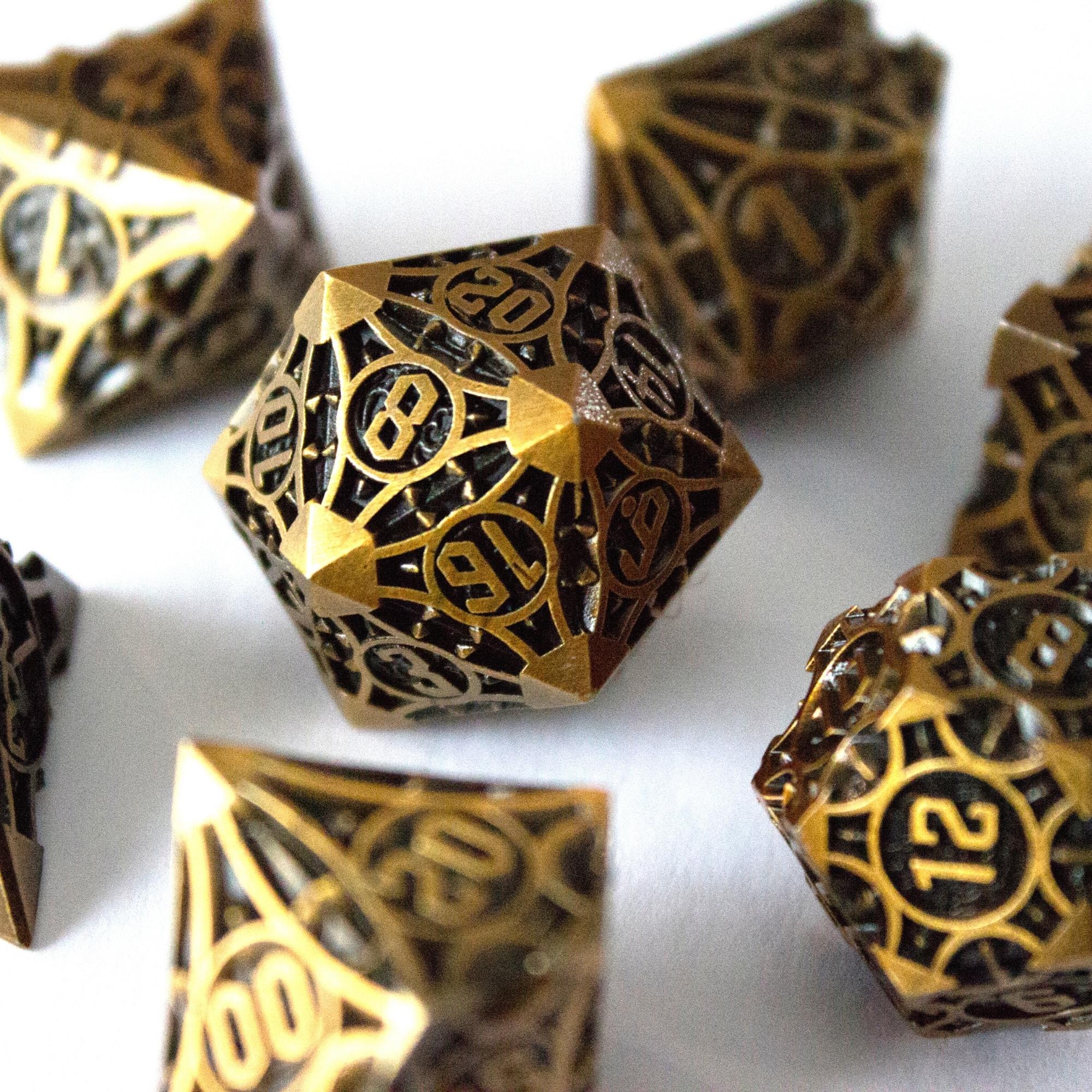 Black and Brass Zinc Alloy Metal Dice (7pc Set)